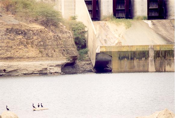 Close-up of ski-jump spillway at Poechos Dam, showing erosion damage 