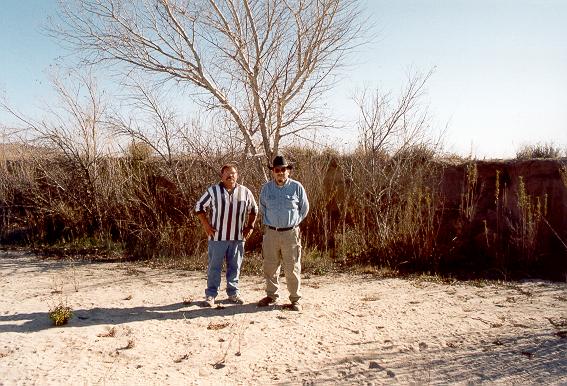 On top of Arroyo El Barbon, with rancher; note vertical streambank.