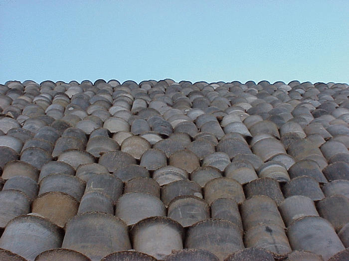 Up view of retaining wall built with discarded tires.