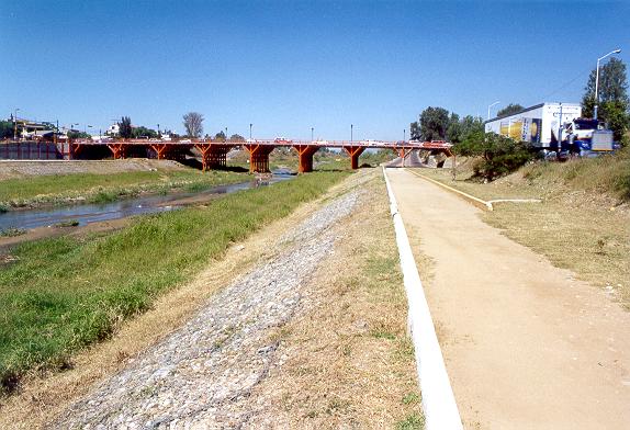 View of the Atoyac river and the bridge located at the upstream end of the project.